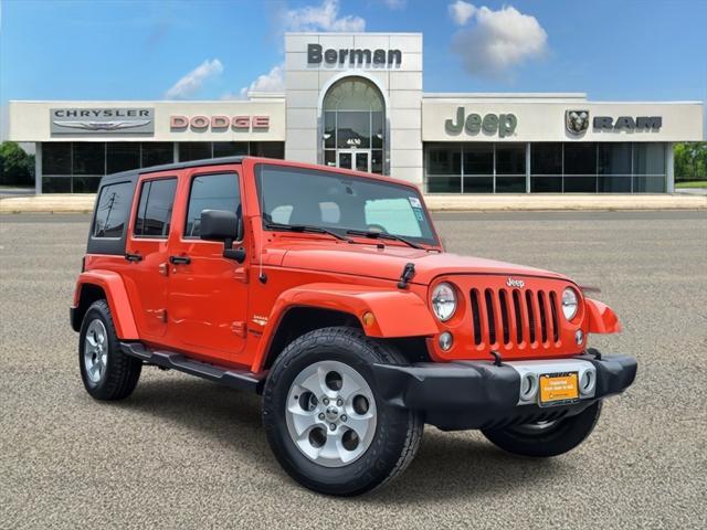 used 2015 Jeep Wrangler Unlimited car, priced at $18,503