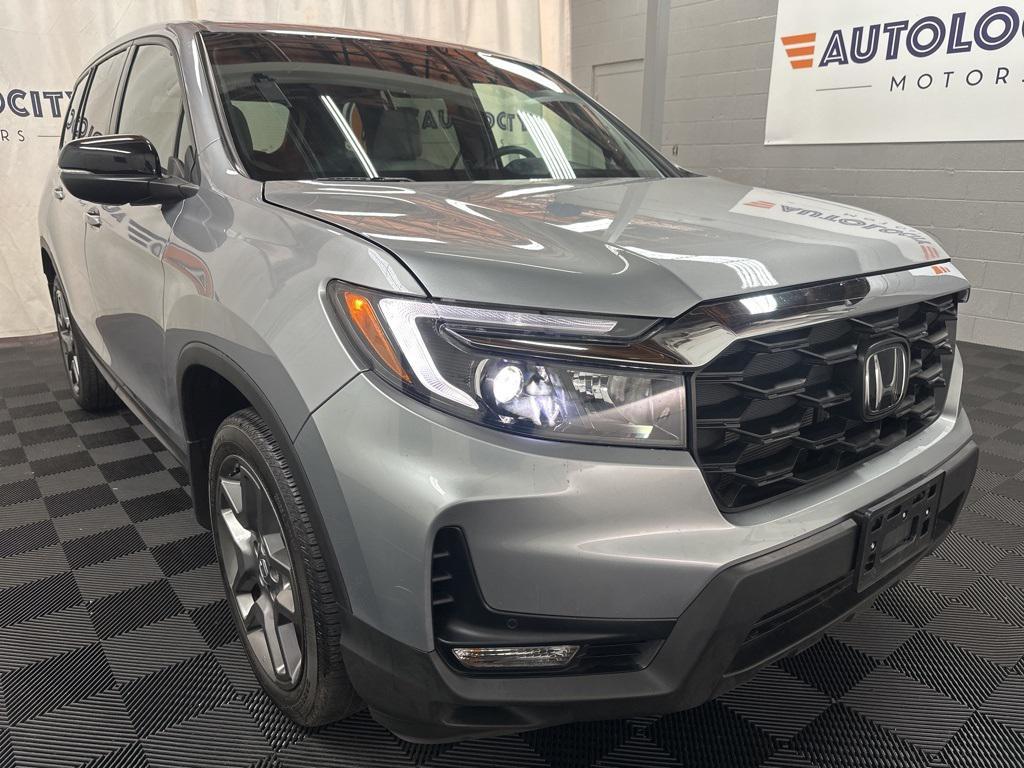 used 2023 Honda Passport car, priced at $27,500