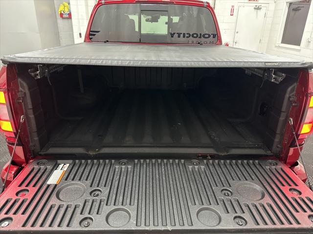 used 2024 Nissan Frontier car, priced at $33,000