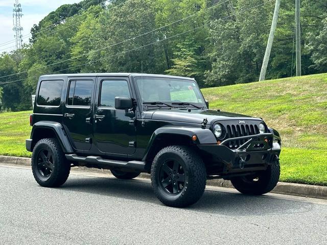 used 2011 Jeep Wrangler Unlimited car, priced at $15,990