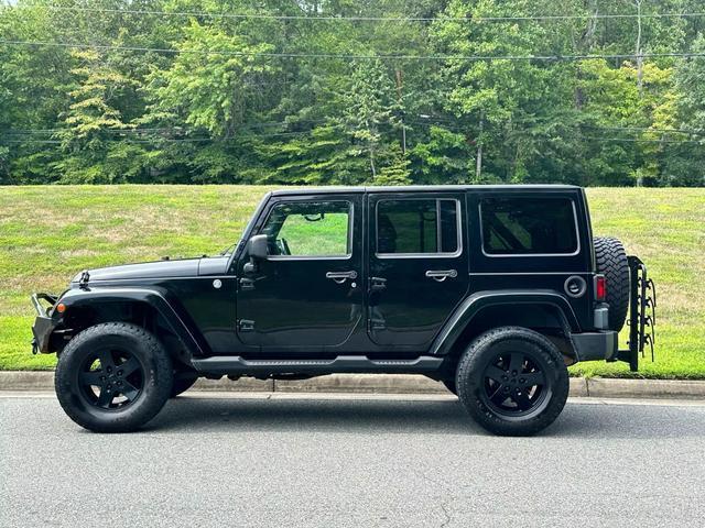 used 2011 Jeep Wrangler Unlimited car, priced at $15,990