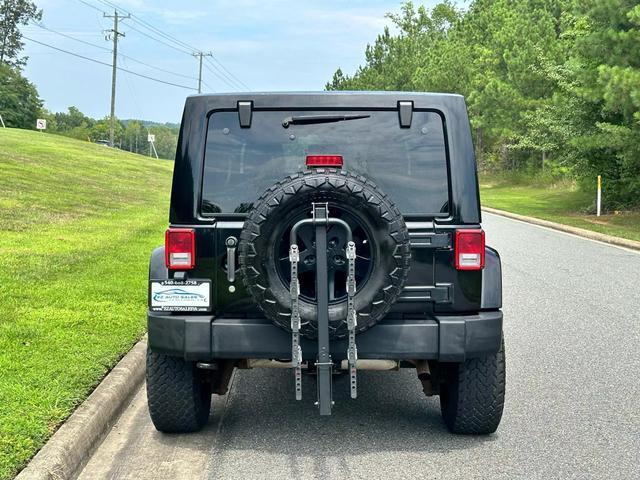 used 2011 Jeep Wrangler Unlimited car, priced at $15,990