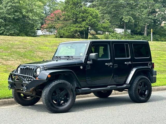 used 2011 Jeep Wrangler Unlimited car, priced at $15,990