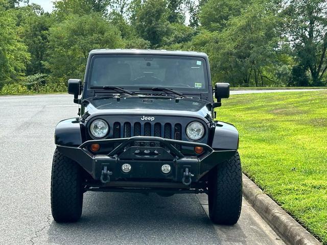 used 2011 Jeep Wrangler Unlimited car, priced at $15,990