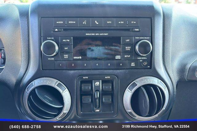 used 2012 Jeep Wrangler Unlimited car, priced at $14,990