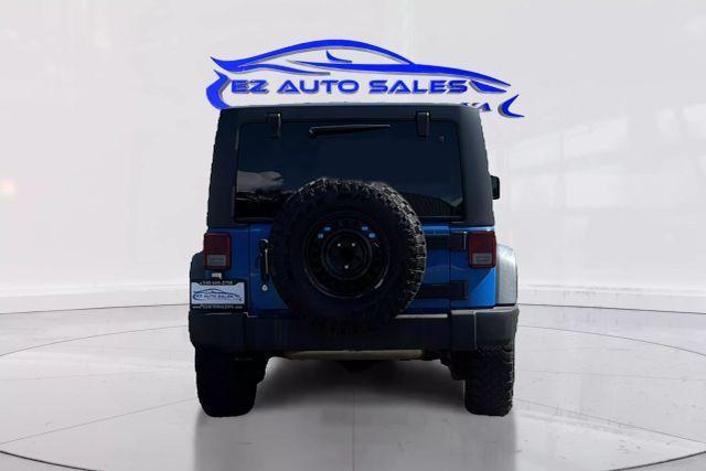 used 2012 Jeep Wrangler Unlimited car, priced at $14,990
