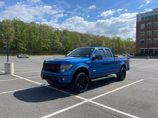 used 2013 Ford F-150 car, priced at $17,990