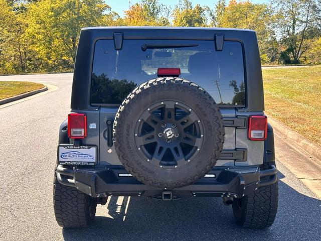 used 2014 Jeep Wrangler Unlimited car, priced at $20,990