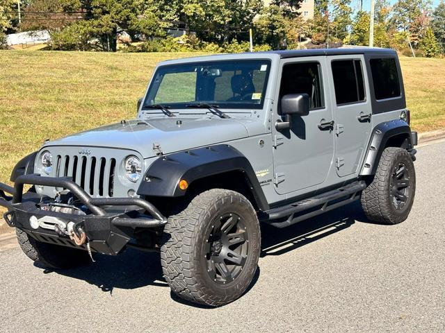 used 2014 Jeep Wrangler Unlimited car, priced at $20,990