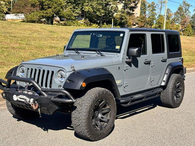 used 2014 Jeep Wrangler Unlimited car, priced at $20,990