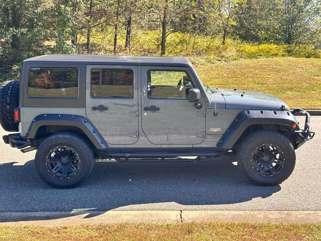 used 2014 Jeep Wrangler Unlimited car, priced at $20,990