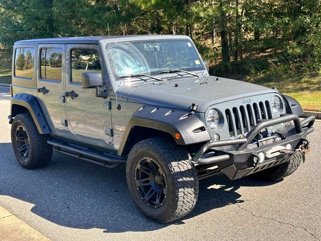 used 2014 Jeep Wrangler Unlimited car, priced at $20,990