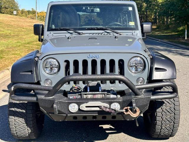 used 2014 Jeep Wrangler Unlimited car, priced at $20,990