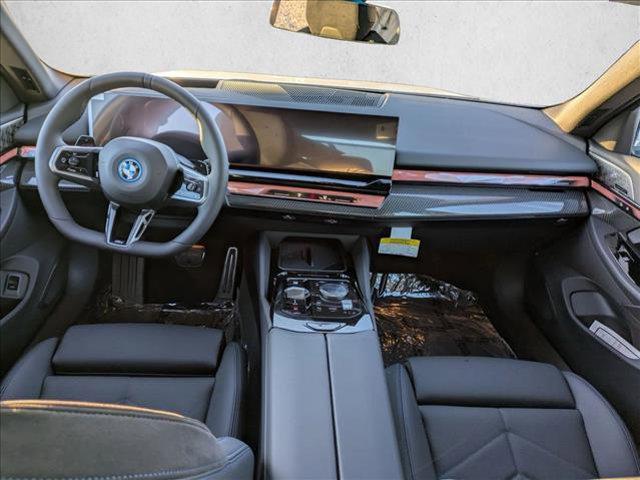 new 2026 BMW 550e car, priced at $88,640