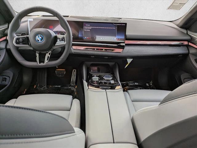 new 2026 BMW 550e car, priced at $92,740