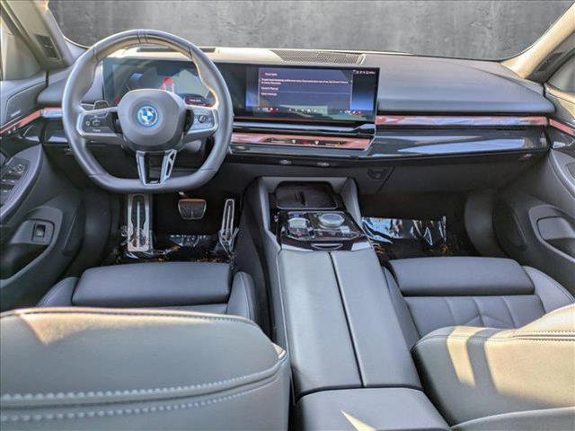 used 2024 BMW i5 car, priced at $52,998
