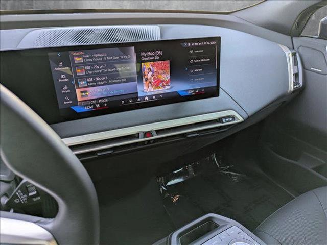 used 2024 BMW iX car, priced at $62,995