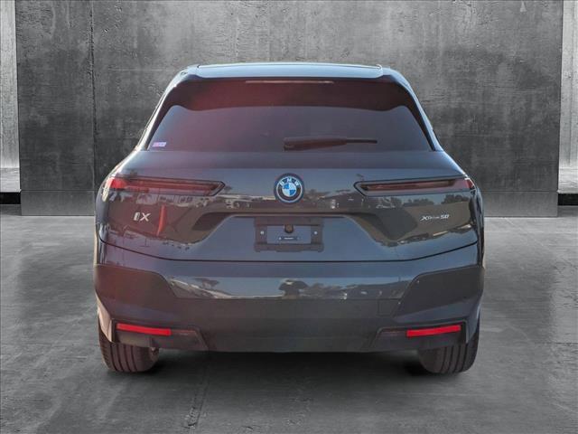 used 2024 BMW iX car, priced at $62,995