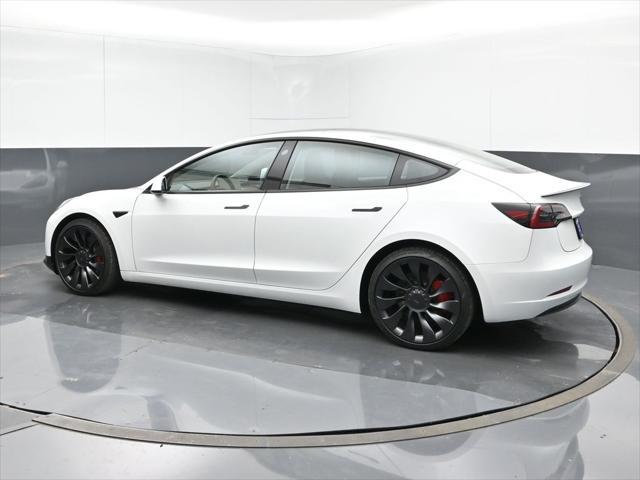 used 2023 Tesla Model 3 car, priced at $34,991