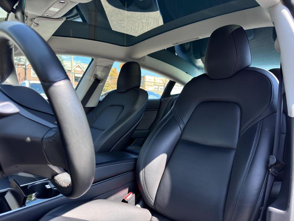 used 2018 Tesla Model 3 car, priced at $19,499