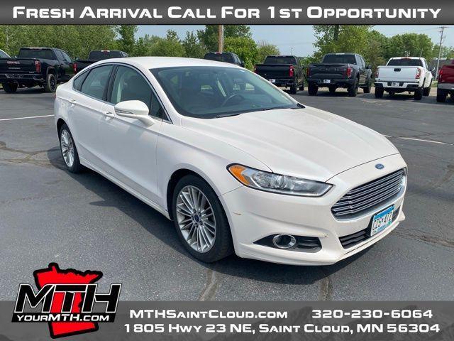 used 2016 Ford Fusion car, priced at $8,999