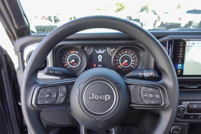 used 2024 Jeep Wrangler car, priced at $33,900