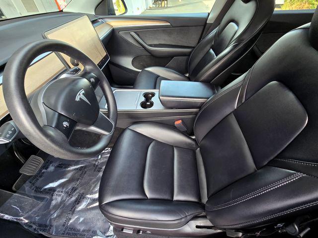 used 2023 Tesla Model Y car, priced at $30,558