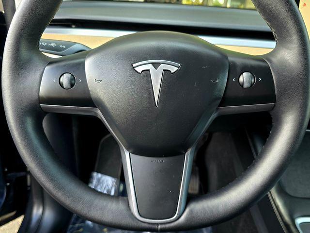 used 2023 Tesla Model Y car, priced at $30,558