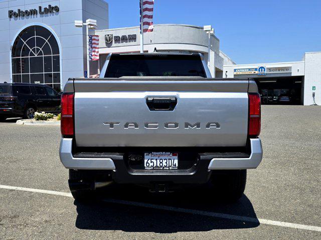 used 2025 Toyota Tacoma car, priced at $38,499