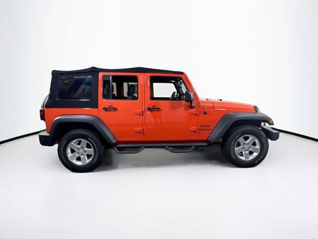 used 2015 Jeep Wrangler Unlimited car, priced at $22,661