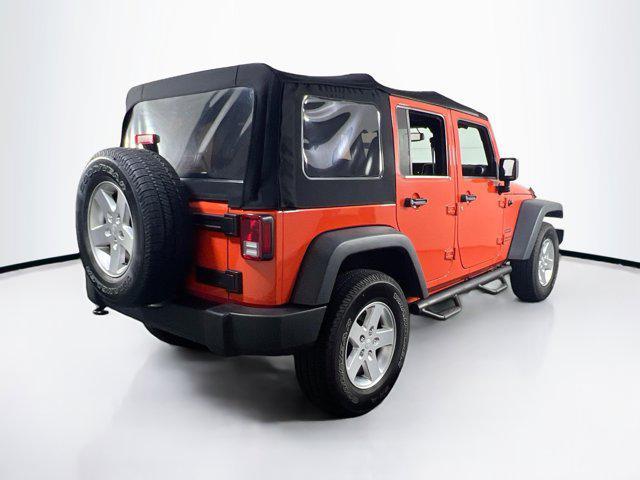 used 2015 Jeep Wrangler Unlimited car, priced at $22,661