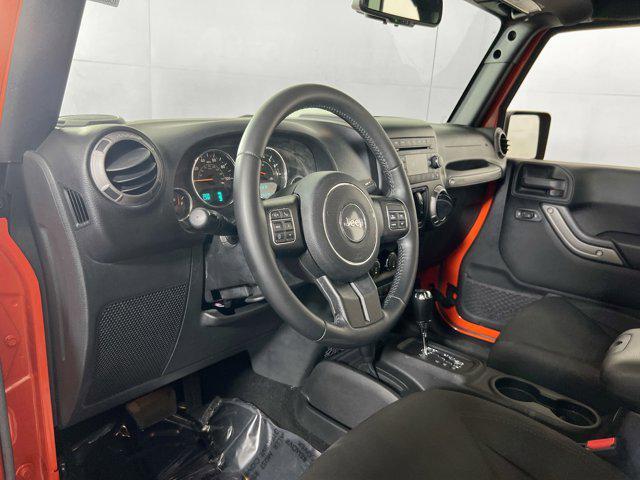 used 2015 Jeep Wrangler Unlimited car, priced at $22,661