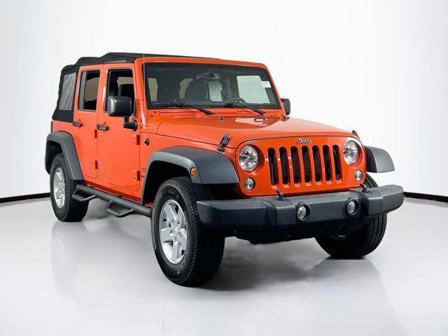 used 2015 Jeep Wrangler Unlimited car, priced at $22,661