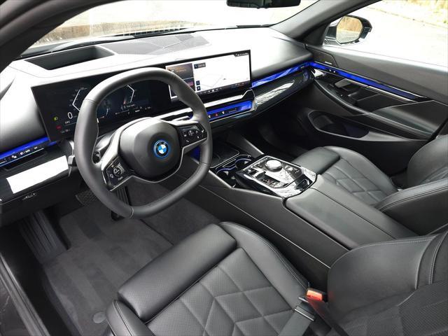 used 2024 BMW i5 car, priced at $48,617