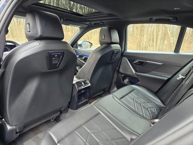 used 2024 BMW i5 car, priced at $48,617