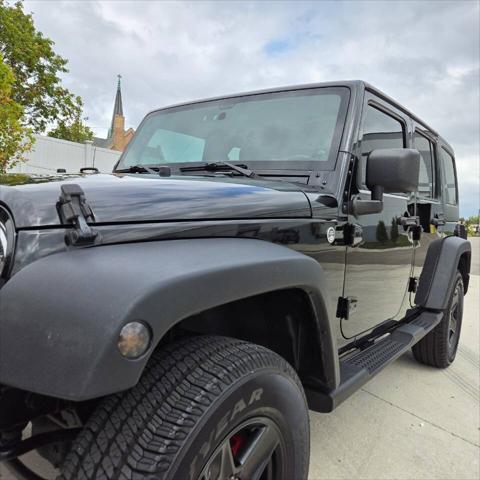 used 2012 Jeep Wrangler Unlimited car, priced at $16,995