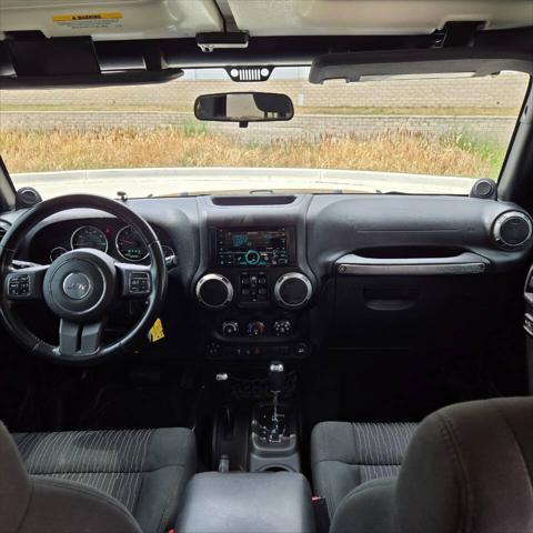 used 2012 Jeep Wrangler Unlimited car, priced at $16,995