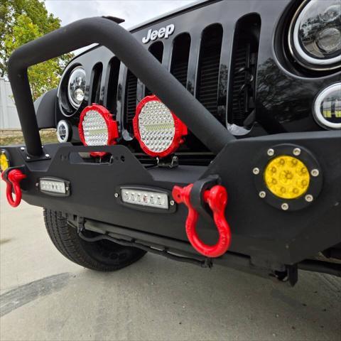 used 2012 Jeep Wrangler Unlimited car, priced at $16,995