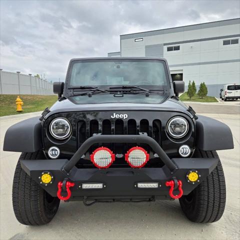 used 2012 Jeep Wrangler Unlimited car, priced at $16,995