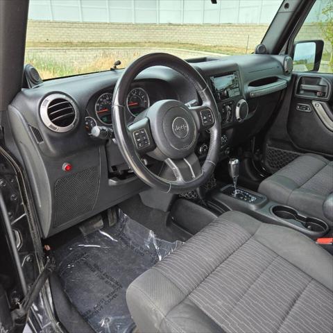 used 2012 Jeep Wrangler Unlimited car, priced at $16,995