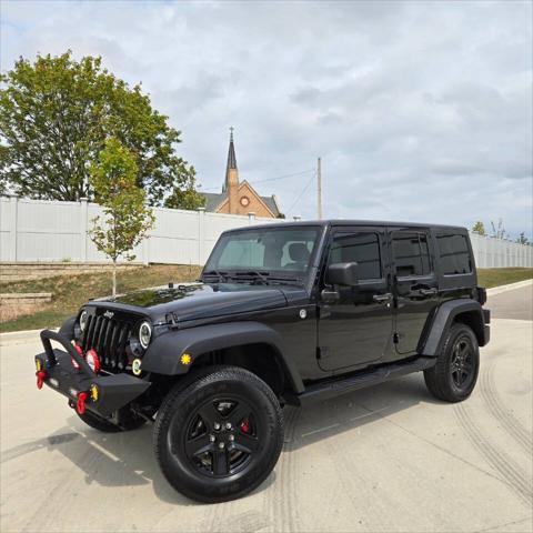 used 2012 Jeep Wrangler Unlimited car, priced at $16,995