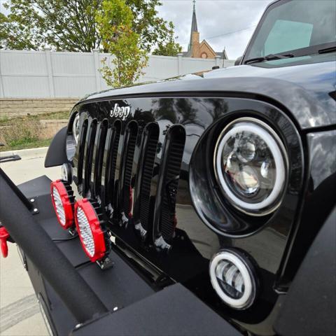 used 2012 Jeep Wrangler Unlimited car, priced at $16,995