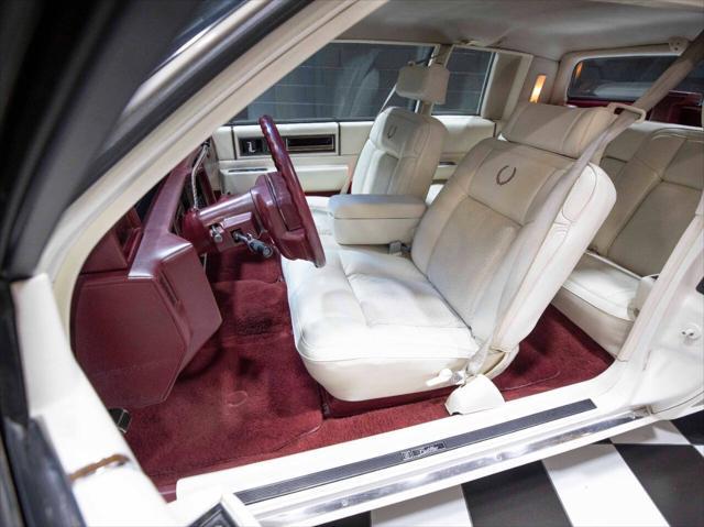 used 1990 Cadillac DeVille car, priced at $19,994