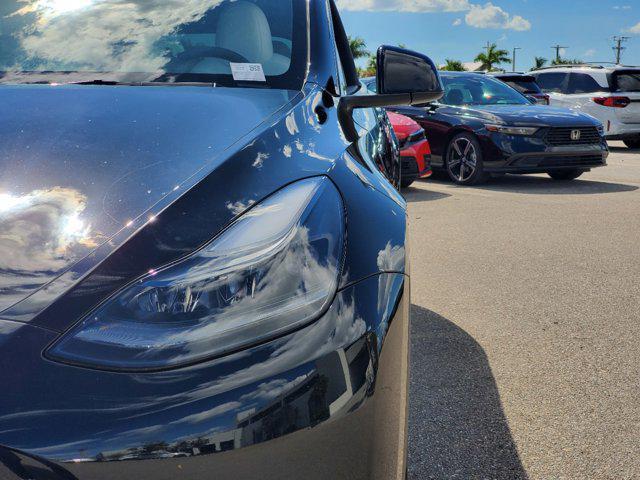 used 2023 Tesla Model Y car, priced at $35,450