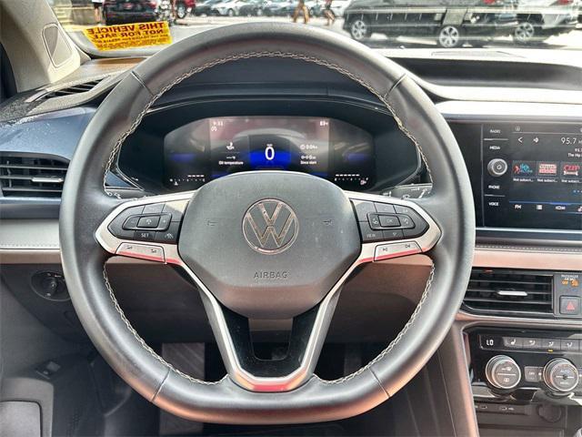 used 2024 Volkswagen Taos car, priced at $20,129