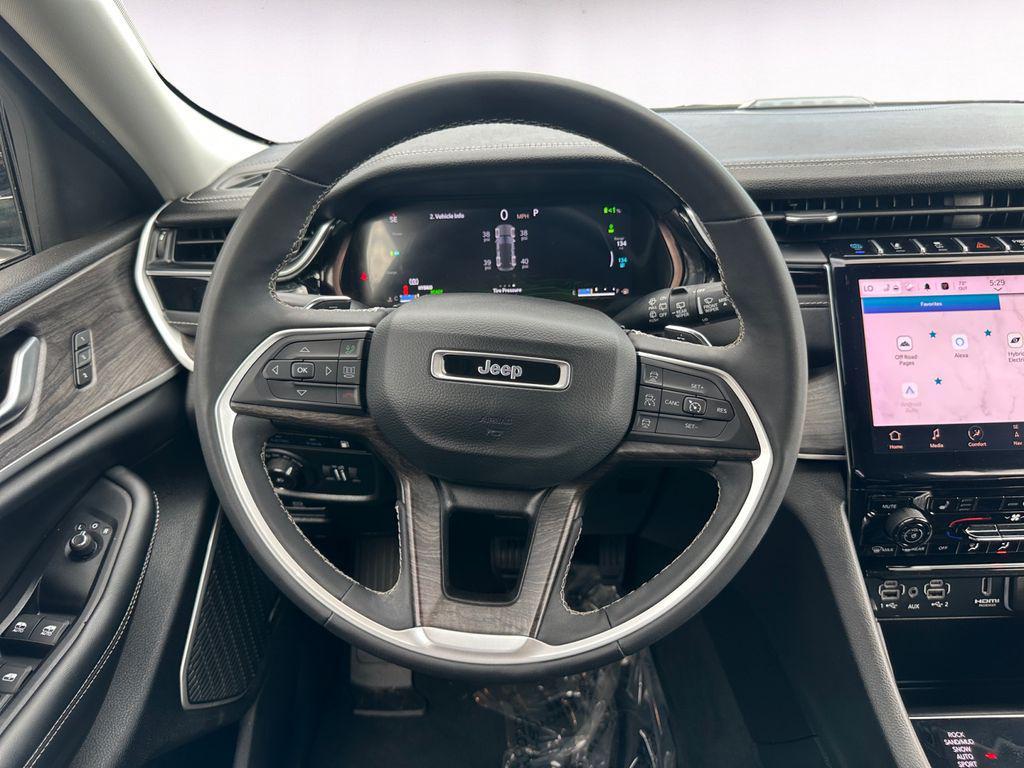 used 2023 Jeep Grand Cherokee 4xe car, priced at $32,155