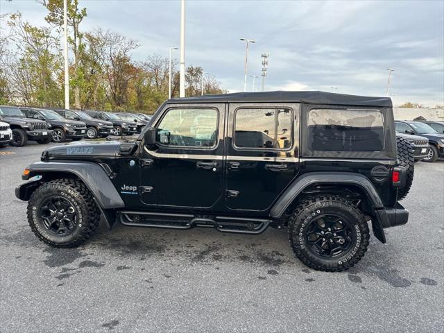 used 2023 Jeep Wrangler 4xe car, priced at $34,000