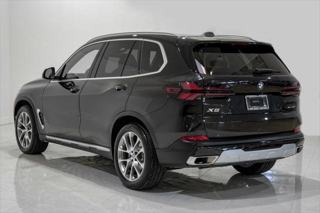 used 2024 BMW X5 car, priced at $68,440