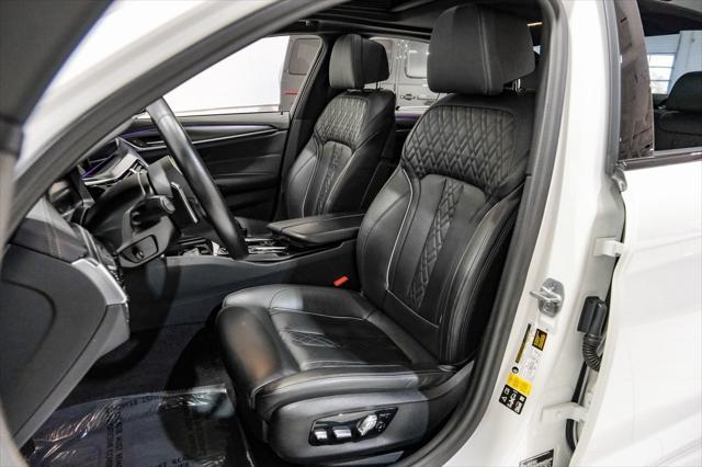 used 2023 BMW M550 car, priced at $68,990