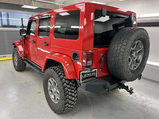 used 2014 Jeep Wrangler Unlimited car, priced at $17,399